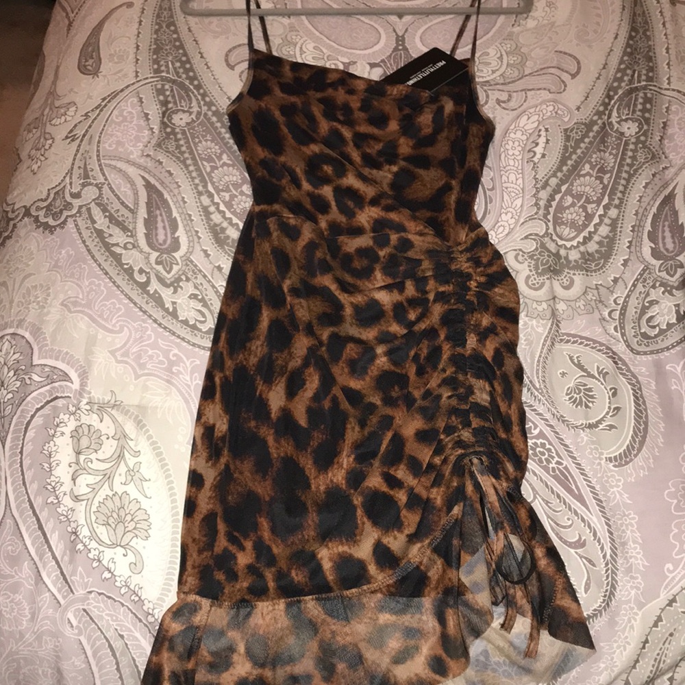 Leopard print ruched mini dress. Size US 4